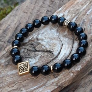 Alternative view of Bracelet Spinelle noir avec perle celtique dorée