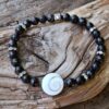 Bracelet en tourmaline noire facettée de 6 mm avec un œil de Sainte Lucie